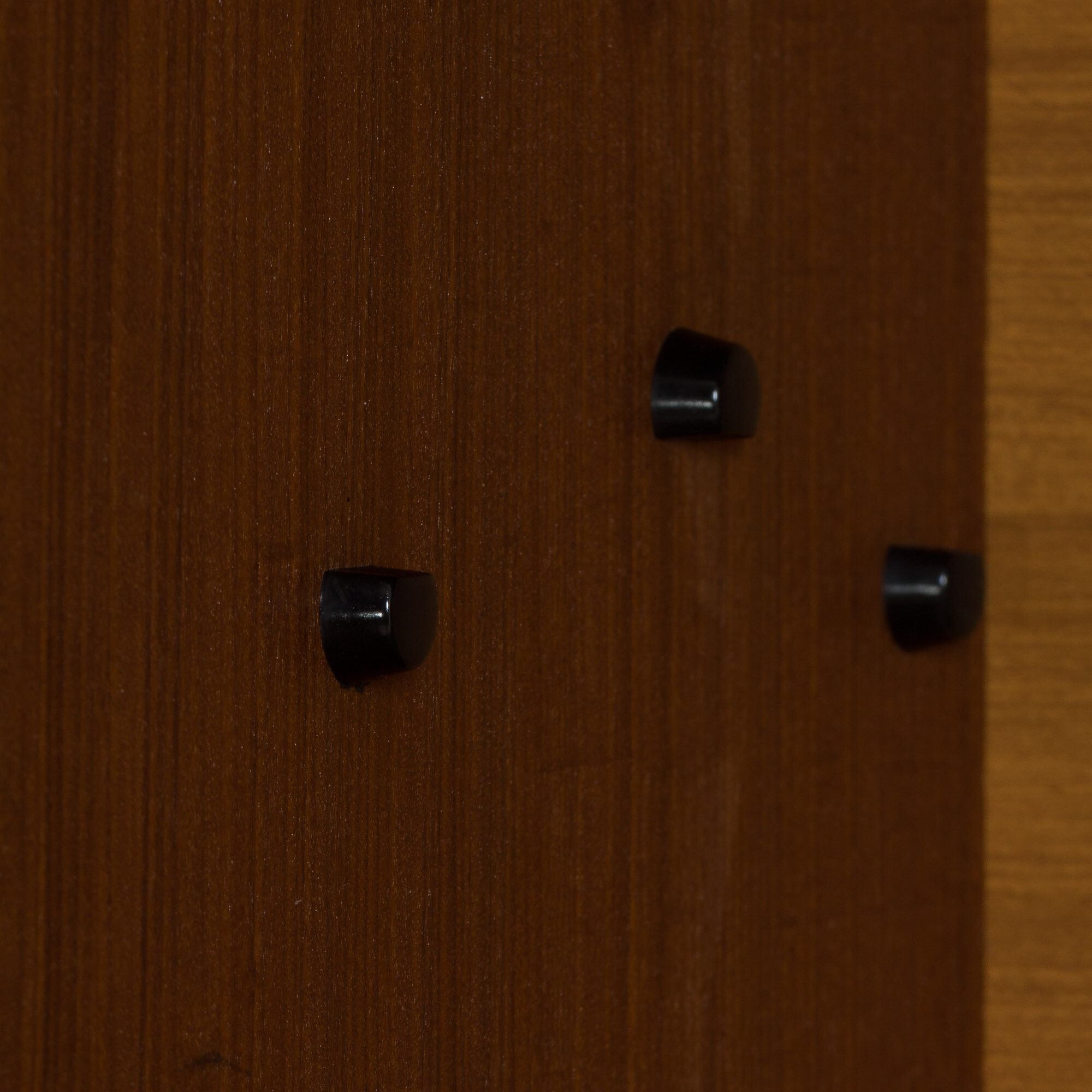 Pair of Italian mid century freestanding wall units in teak with brass handles.