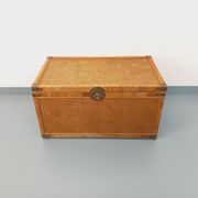 Vintage trunk in wood, rattan, caning, and brass.