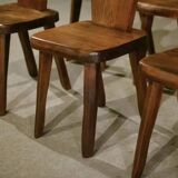 8 chaises brutalistes en orme massif par Aranjou 1950’s