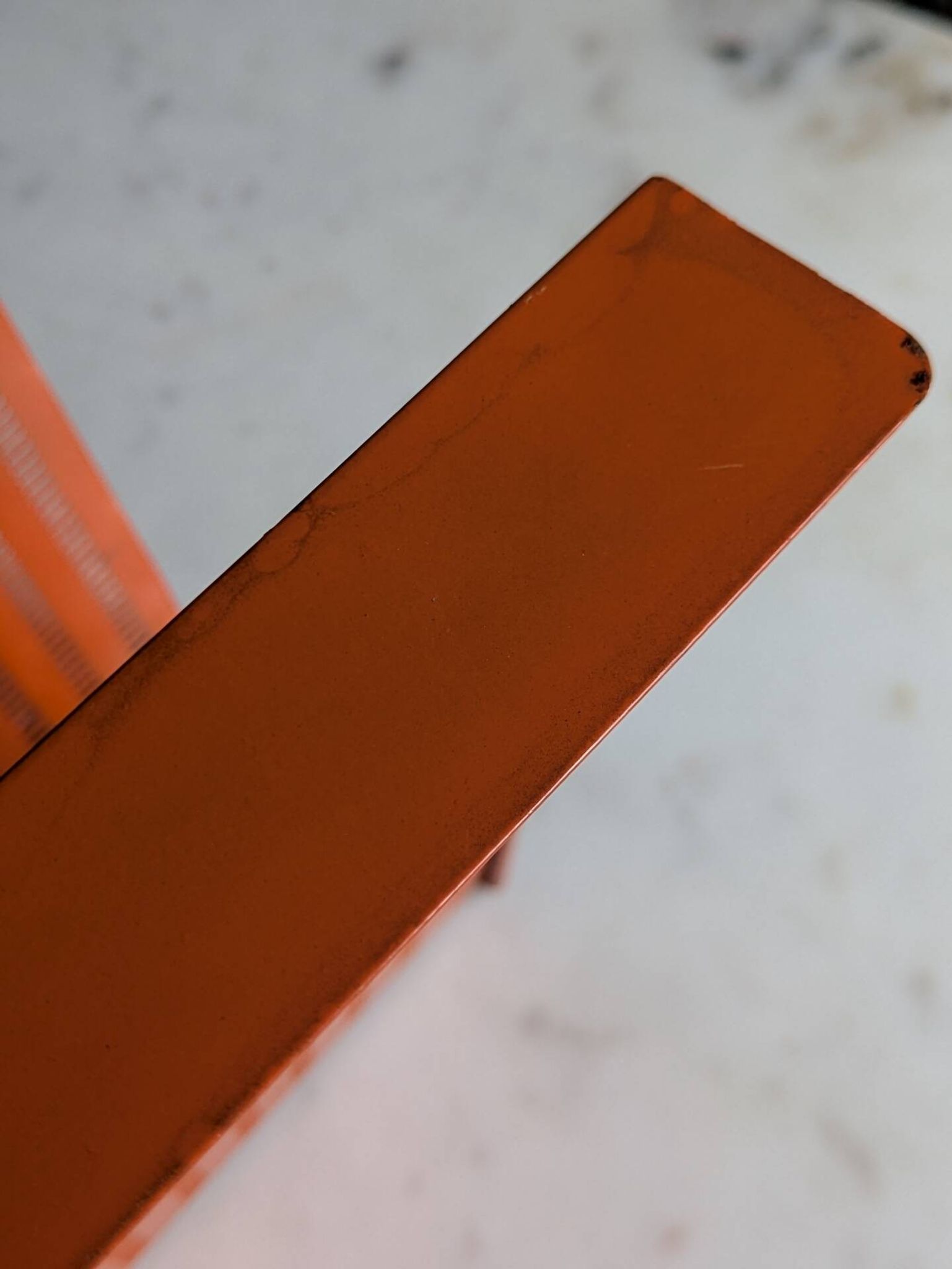 Vintage metal magazine rack in perforated orange/Mathieu Mategot style/70s