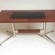 Vintage coffee table from the 1950s in mahogany and metal, with a tabletop width of 110 cm.