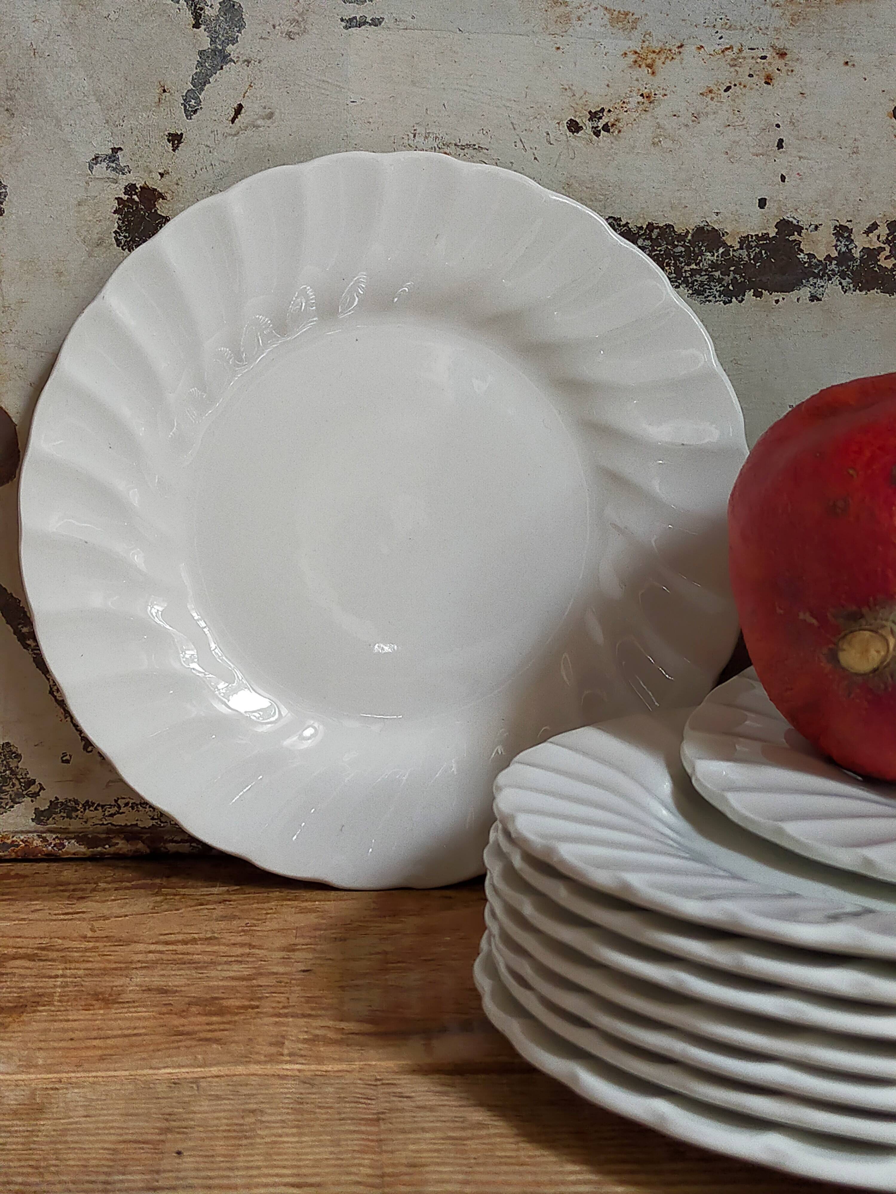 Nine fine English porcelain sweet plates