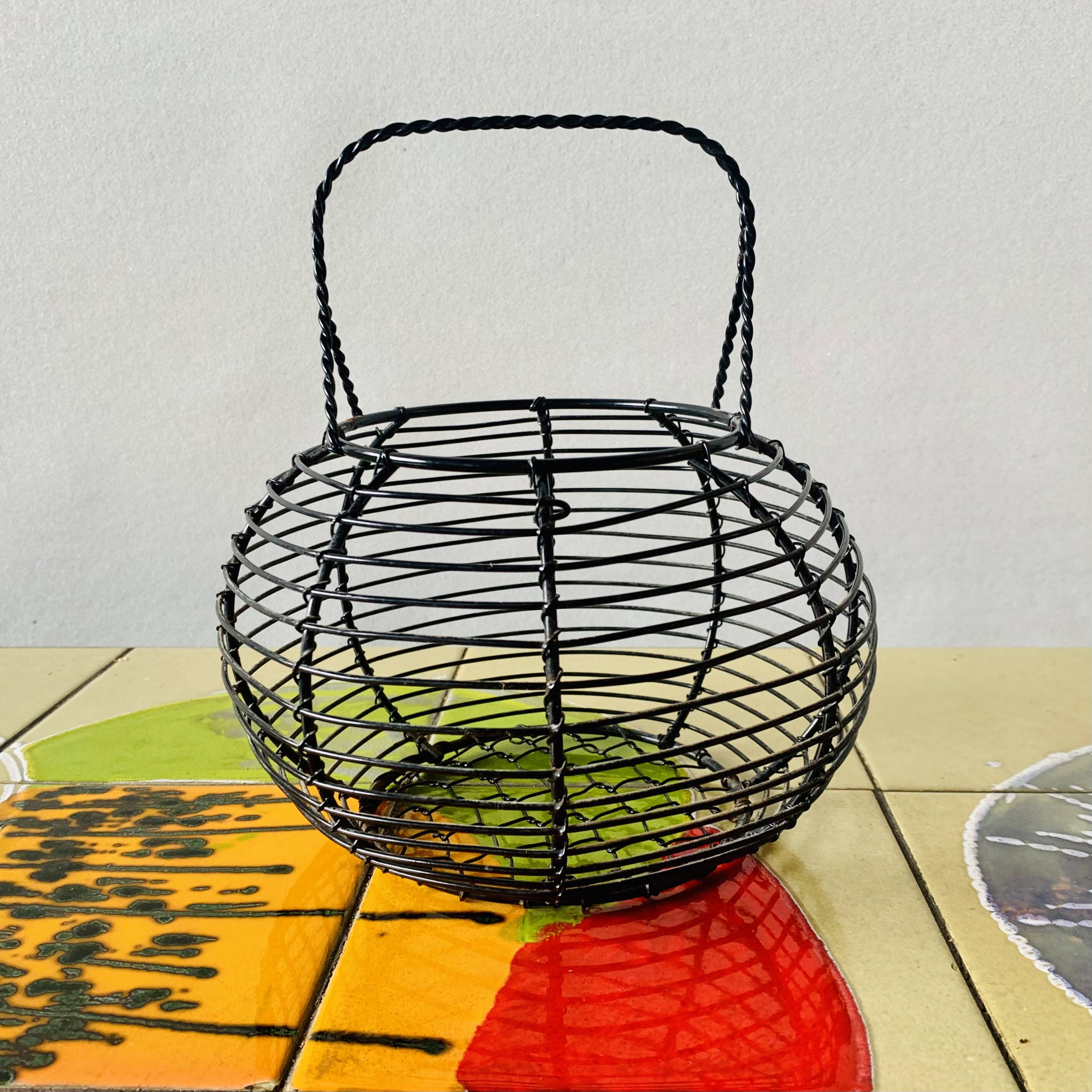 Vintage black metal egg basket