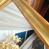 Antique mirror in gilded wood