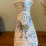 Pitcher with naive bird decor