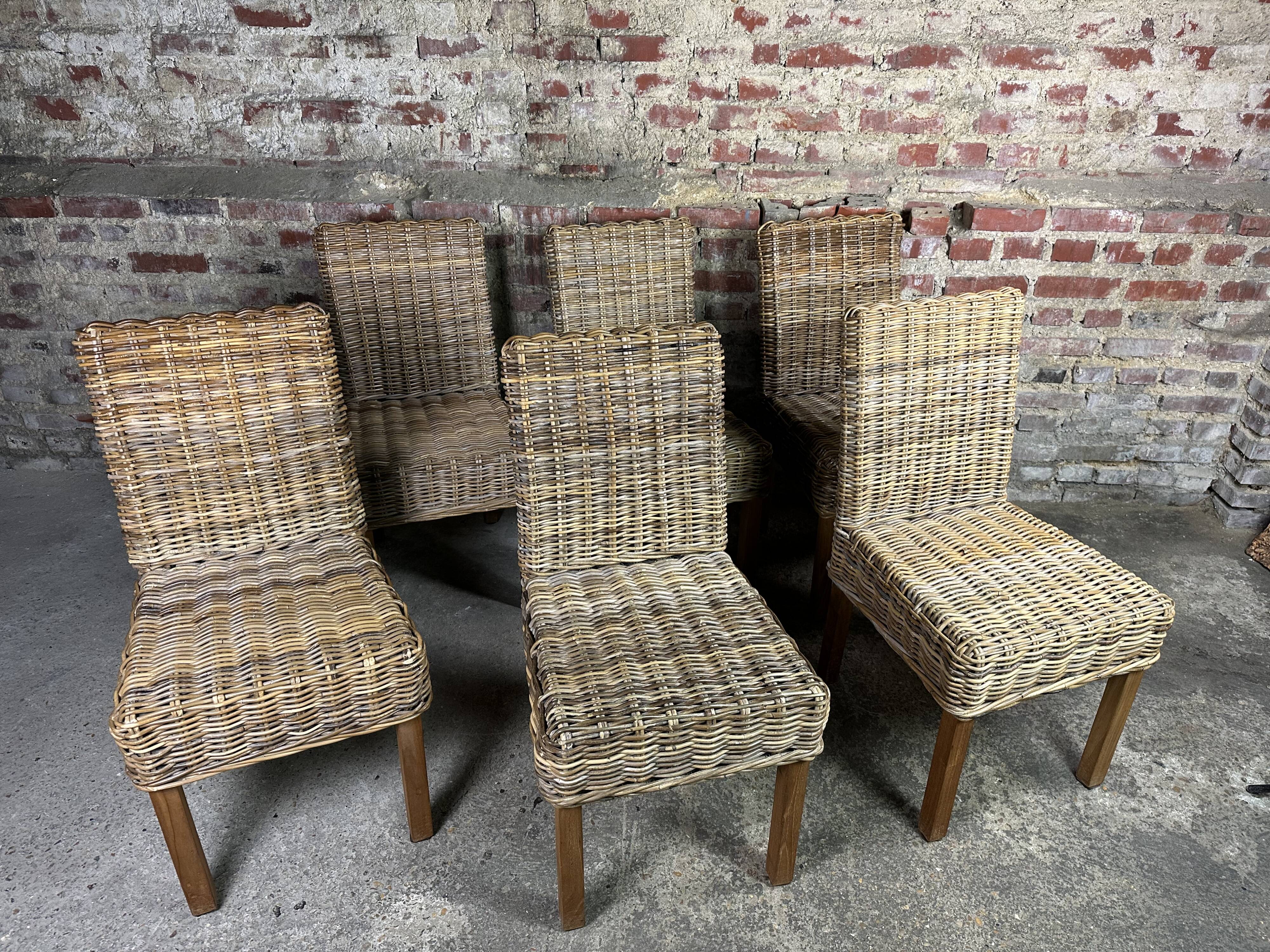 Chairs in wood and woven rattan