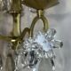 19th-century wall sconce, bronze and crystal pendants.