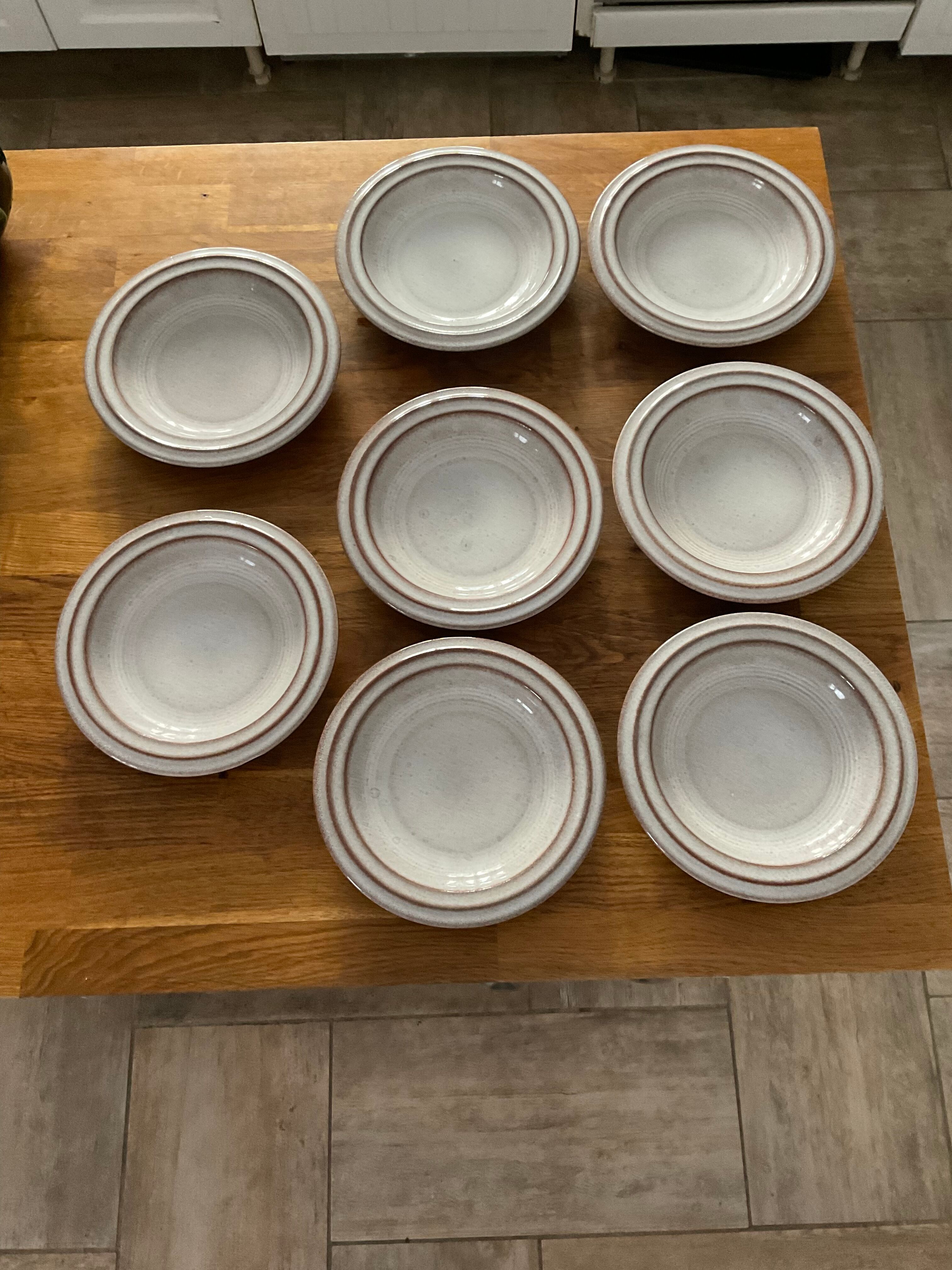 8 hollow plates in glazed terracotta