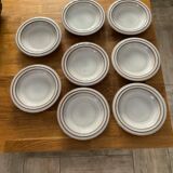 8 hollow plates in glazed terracotta
