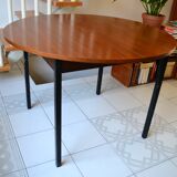 Dining table Pierre Guariche, teak and black steel from the 1960s with extension.