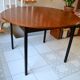 Dining table Pierre Guariche, teak and black steel from the 1960s with extension.