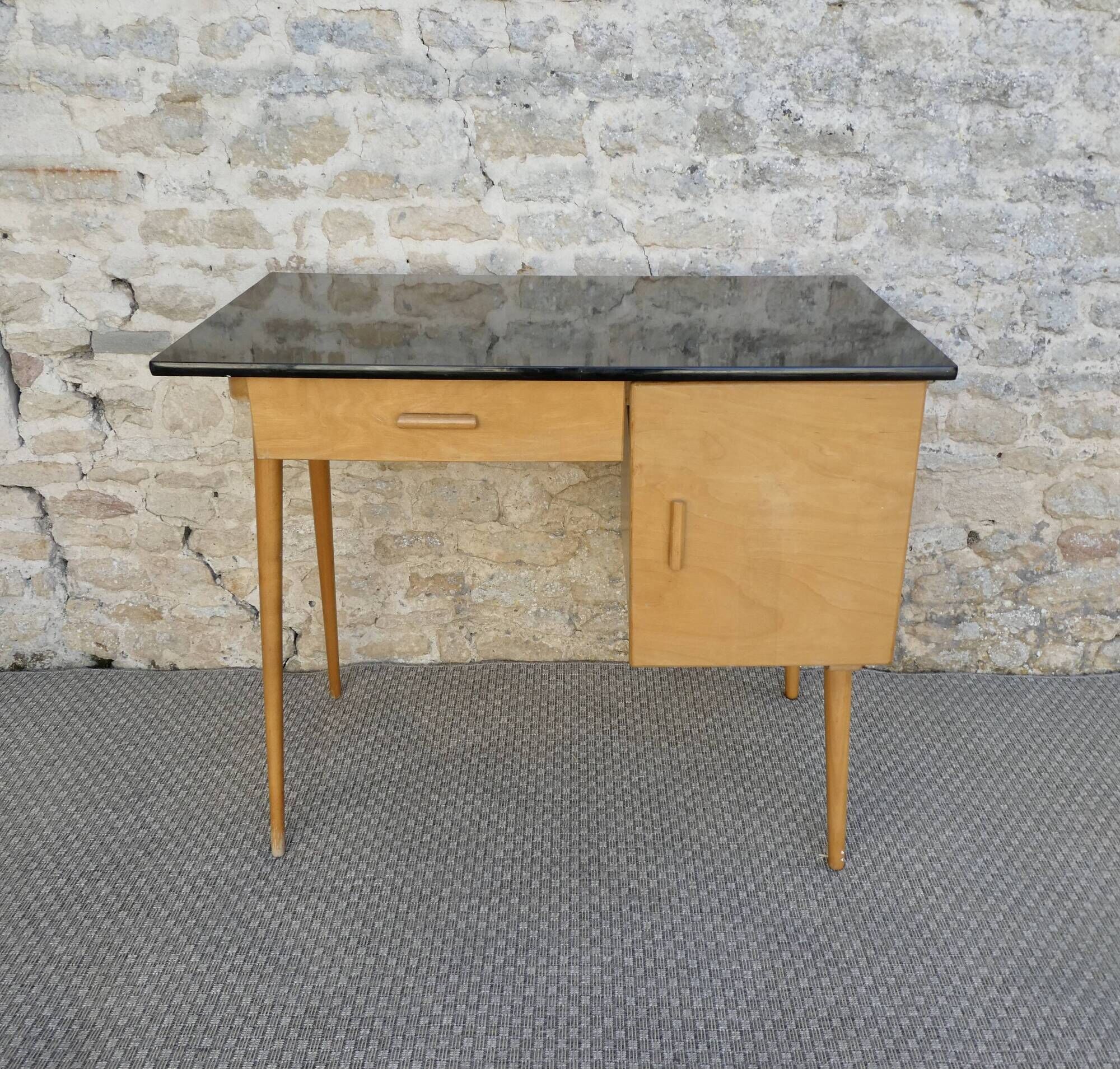 Baumann desk in light wood and black Formica, around 1960.