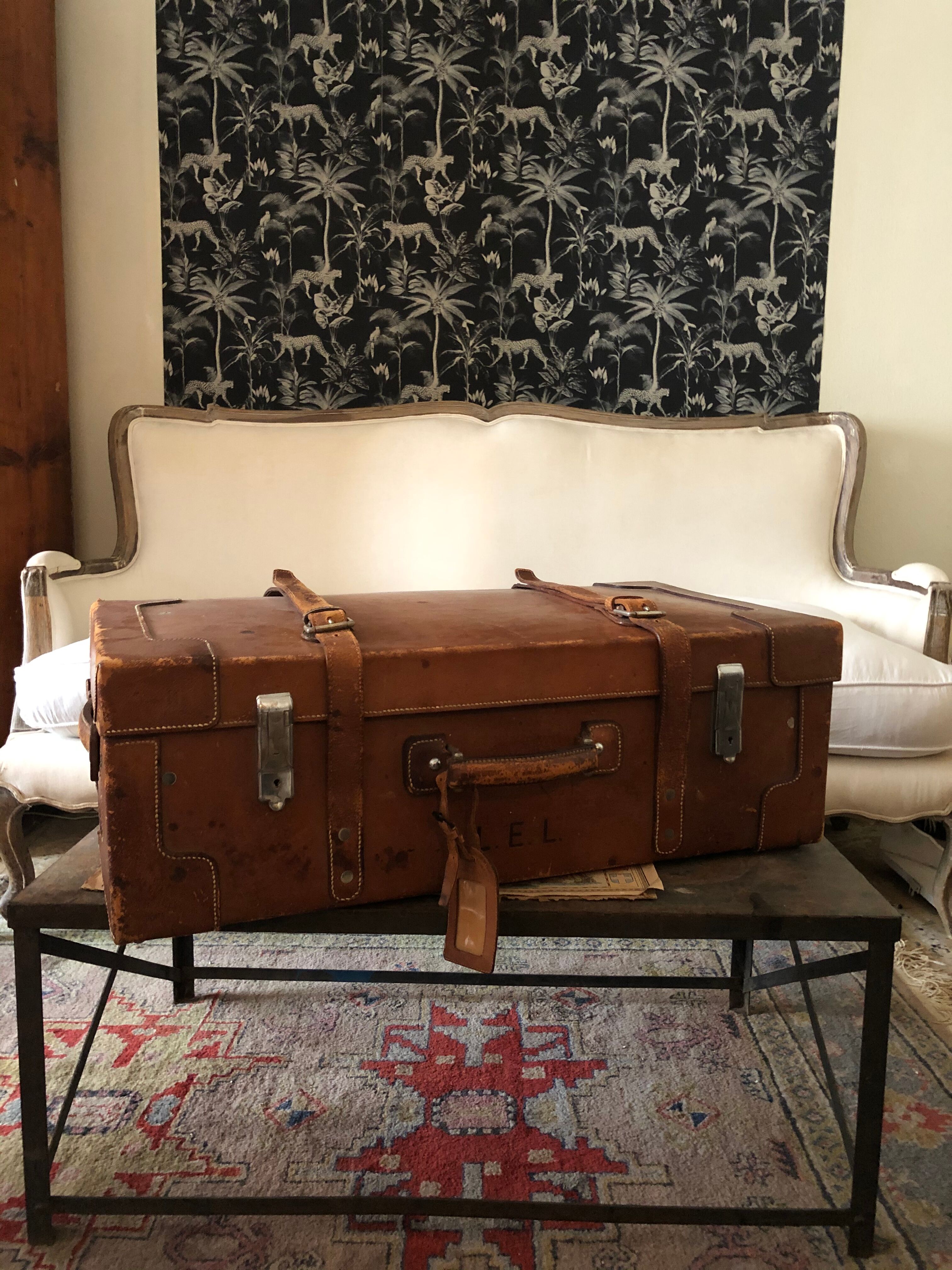Former leather trunk with Louis Vuitton label holder