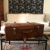 Former leather trunk with Louis Vuitton label holder