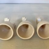 Set of cracked egg cups with feet