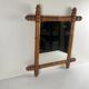 Wooden turned mirror in bamboo style, circa 1900-1930.