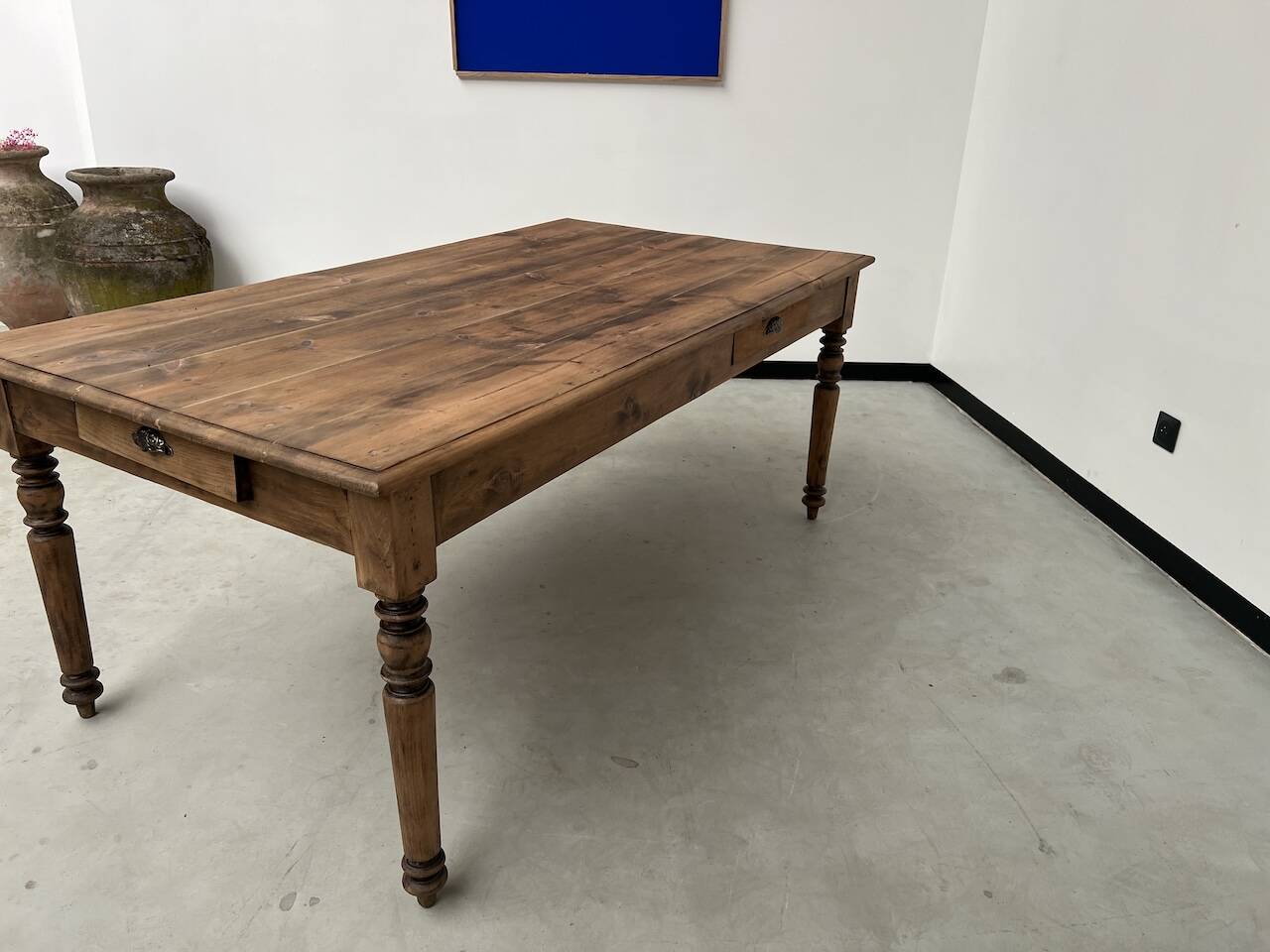 Antique farm table from the 1950s, with 3 drawers and turned legs