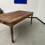 Antique farm table from the 1950s, with 3 drawers and turned legs