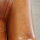 Fauteuil club en cuir très confortable et élégant avec coussin d'assise amovible et design intemporel