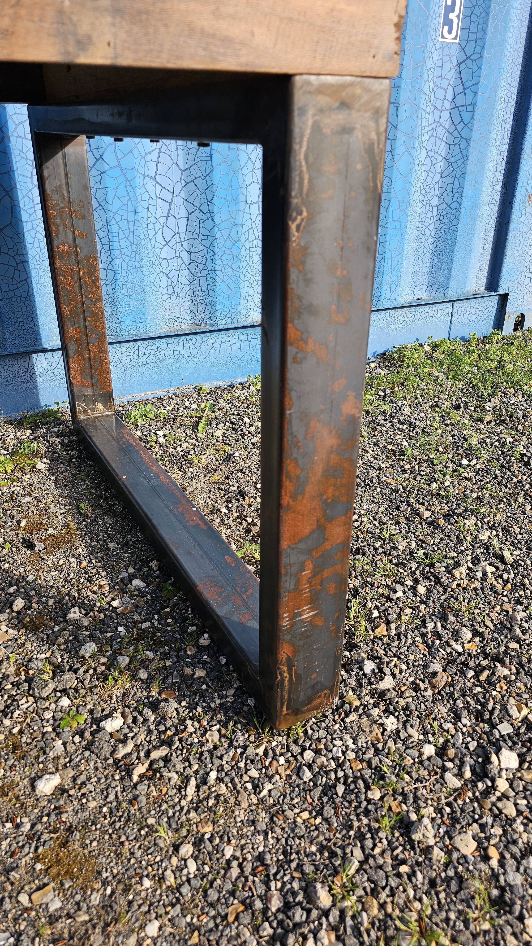 Industrial teak and metal table