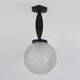 Art Deco hanging lamp in wrought iron Fournet and globe in glass paste