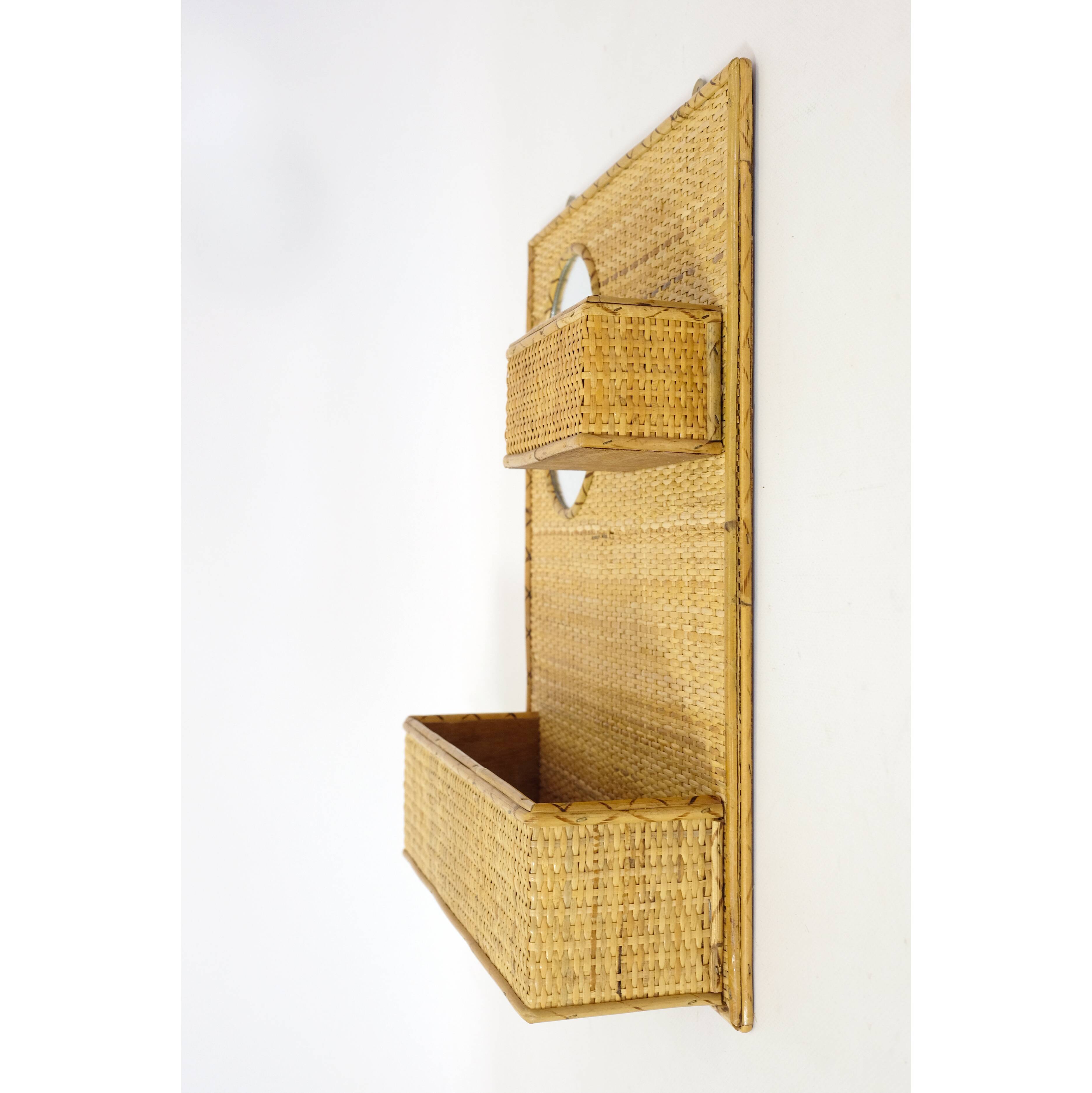 Empty wall pocket and mirror from the 60/70