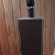 Tall cubic brown leather lamp, light gray fabric lampshade