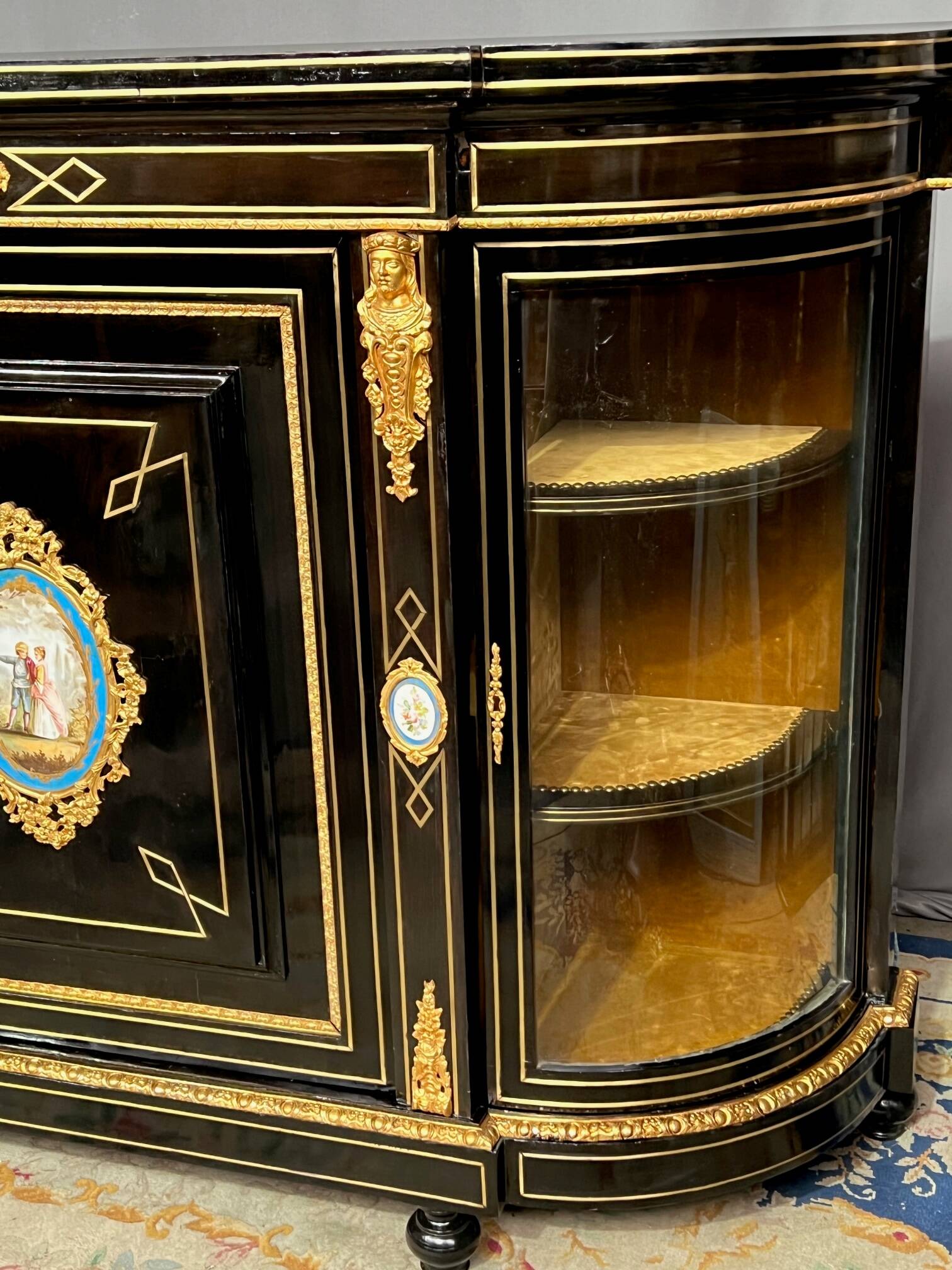 Napoleon III style credenza with four Sèvres medallions.