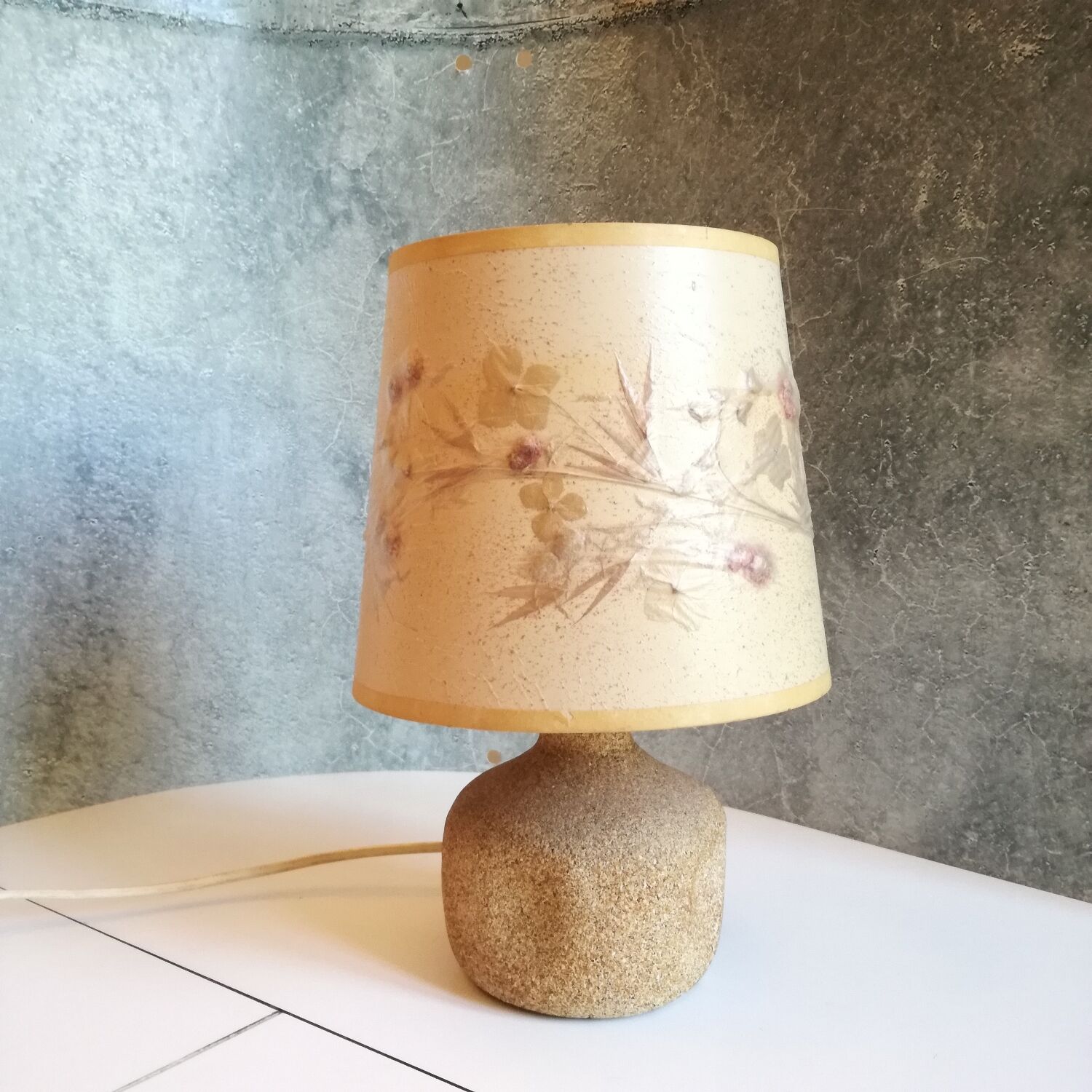 Sand-colored stone lamp