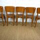 5 chaises années 1960 type scandinave bois et skaï marron fabrication artisanale française Raincy
