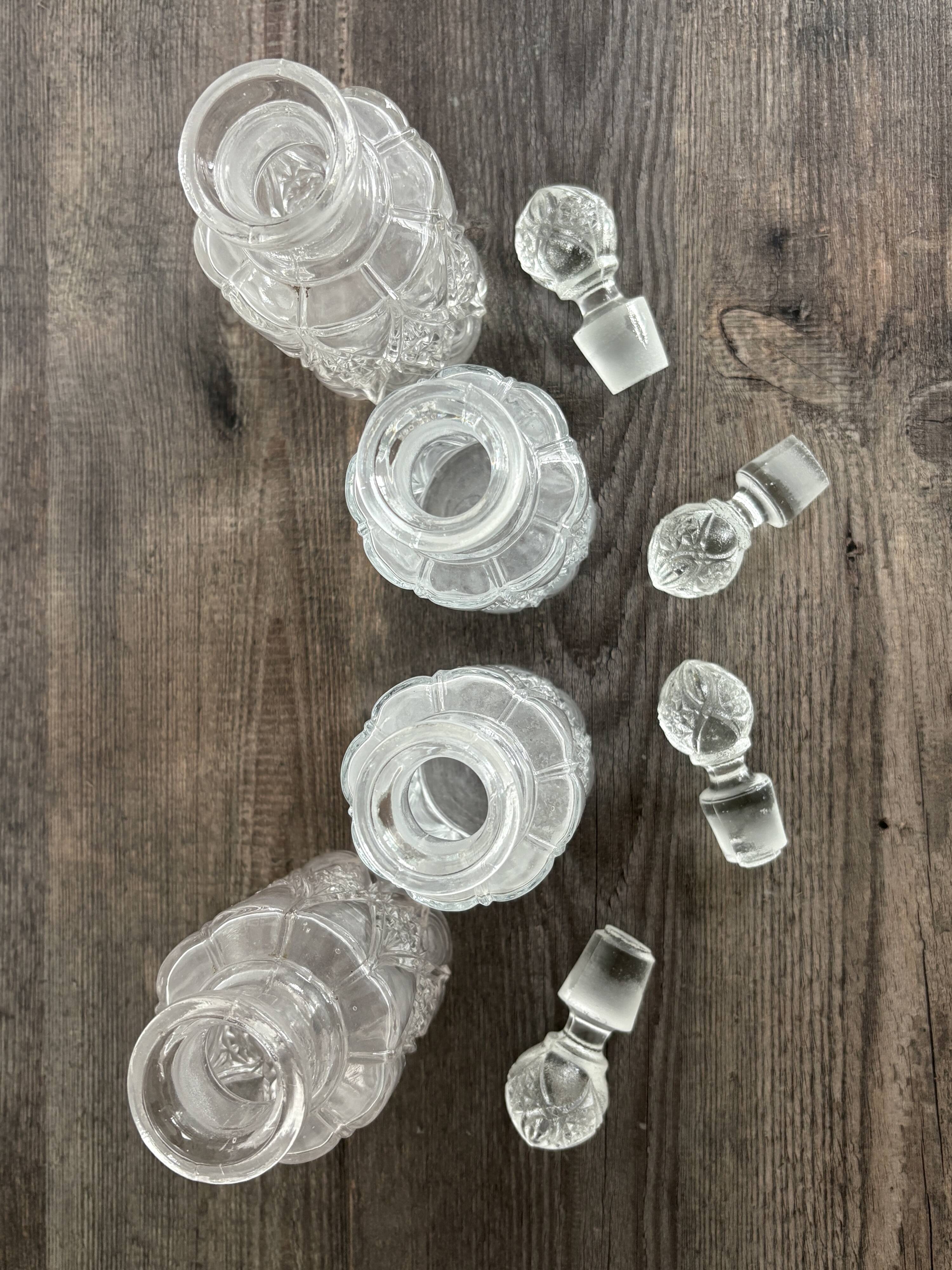 Set of 4 molded crystal bottles – Val Saint Lambert