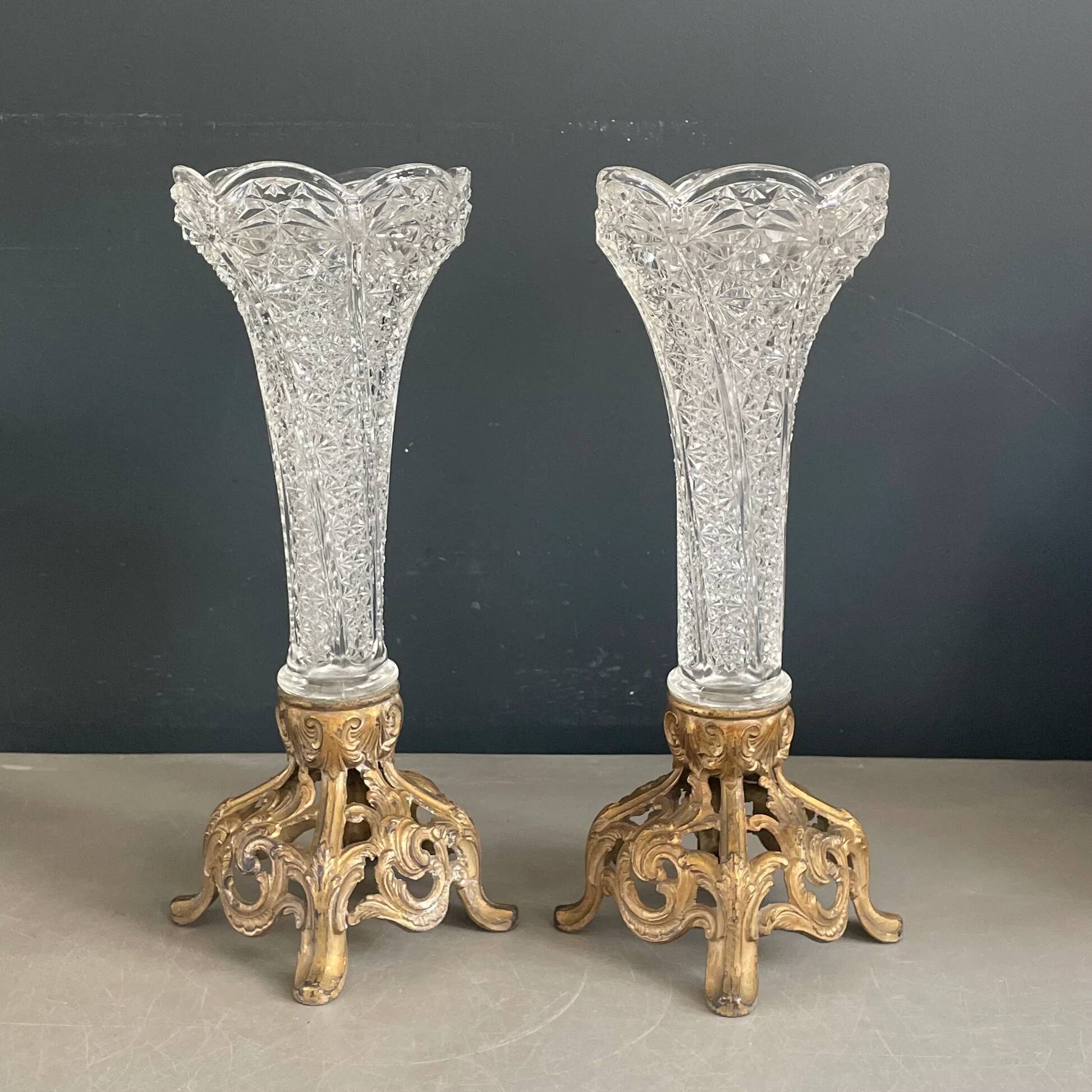 Pair of candlesticks in spelter and moulded glass