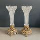 Pair of candlesticks in spelter and moulded glass