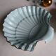 Shell-shaped porcelain dishes.