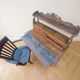 Old wooden tiered desk and its matching chair.