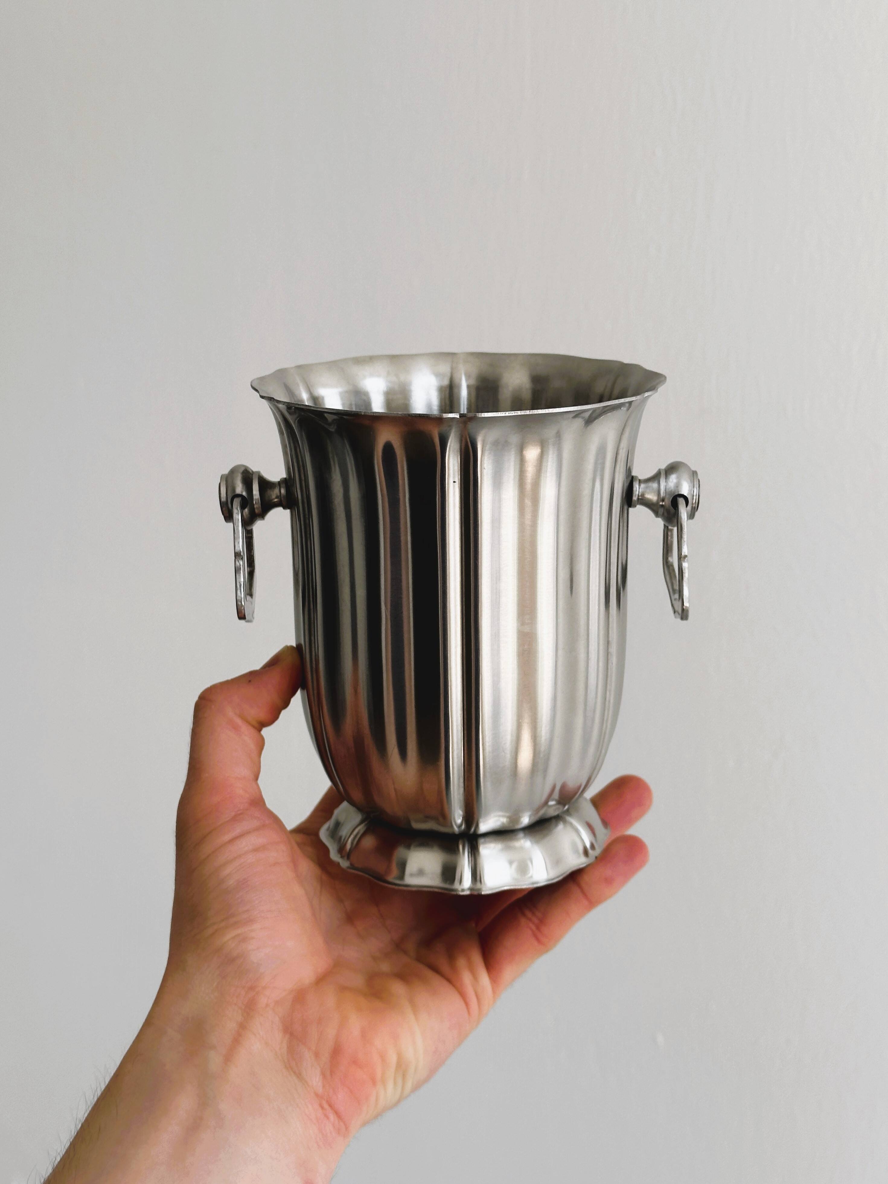 Small shiny stainless steel ice bucket