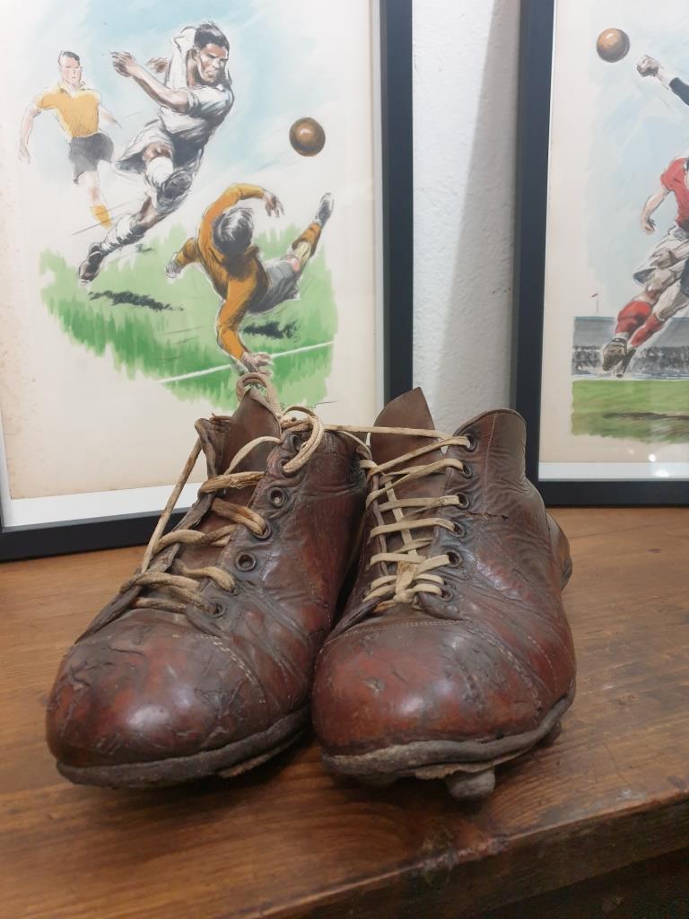 Pair of old football boots, vintage sport