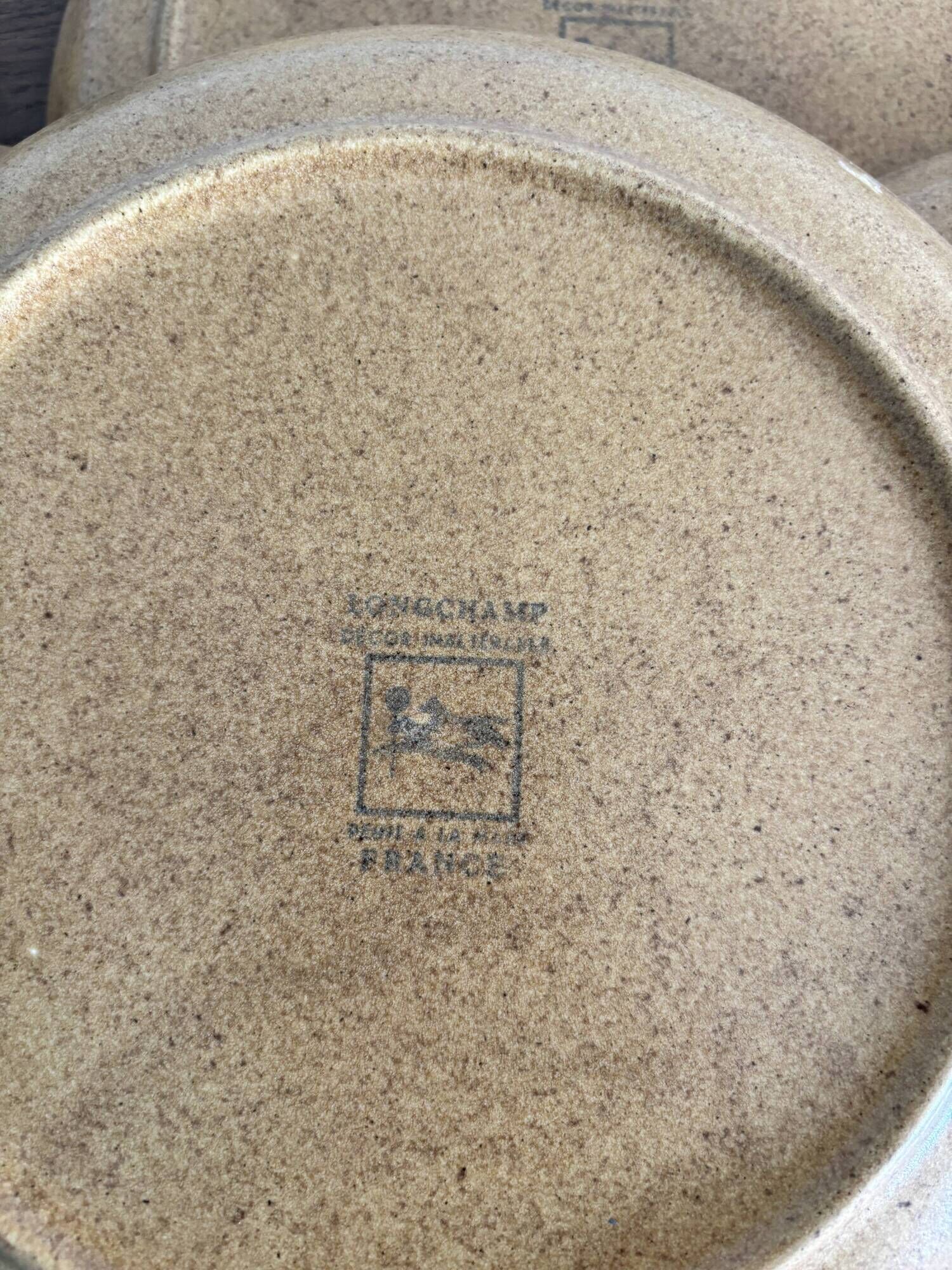 Service of 15 vintage Longchamp plates in stoneware.