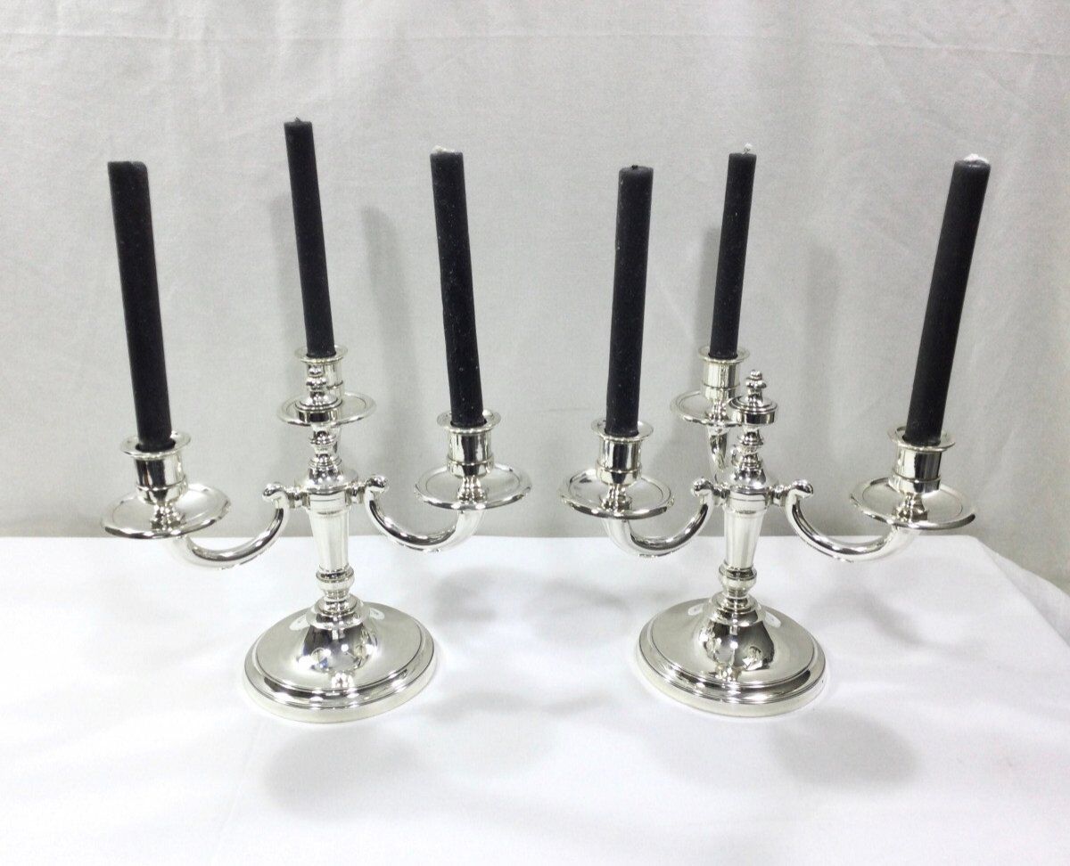 Pair of silver bronze candelabras