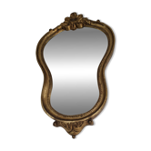 Golden wooden mirror in baroque style