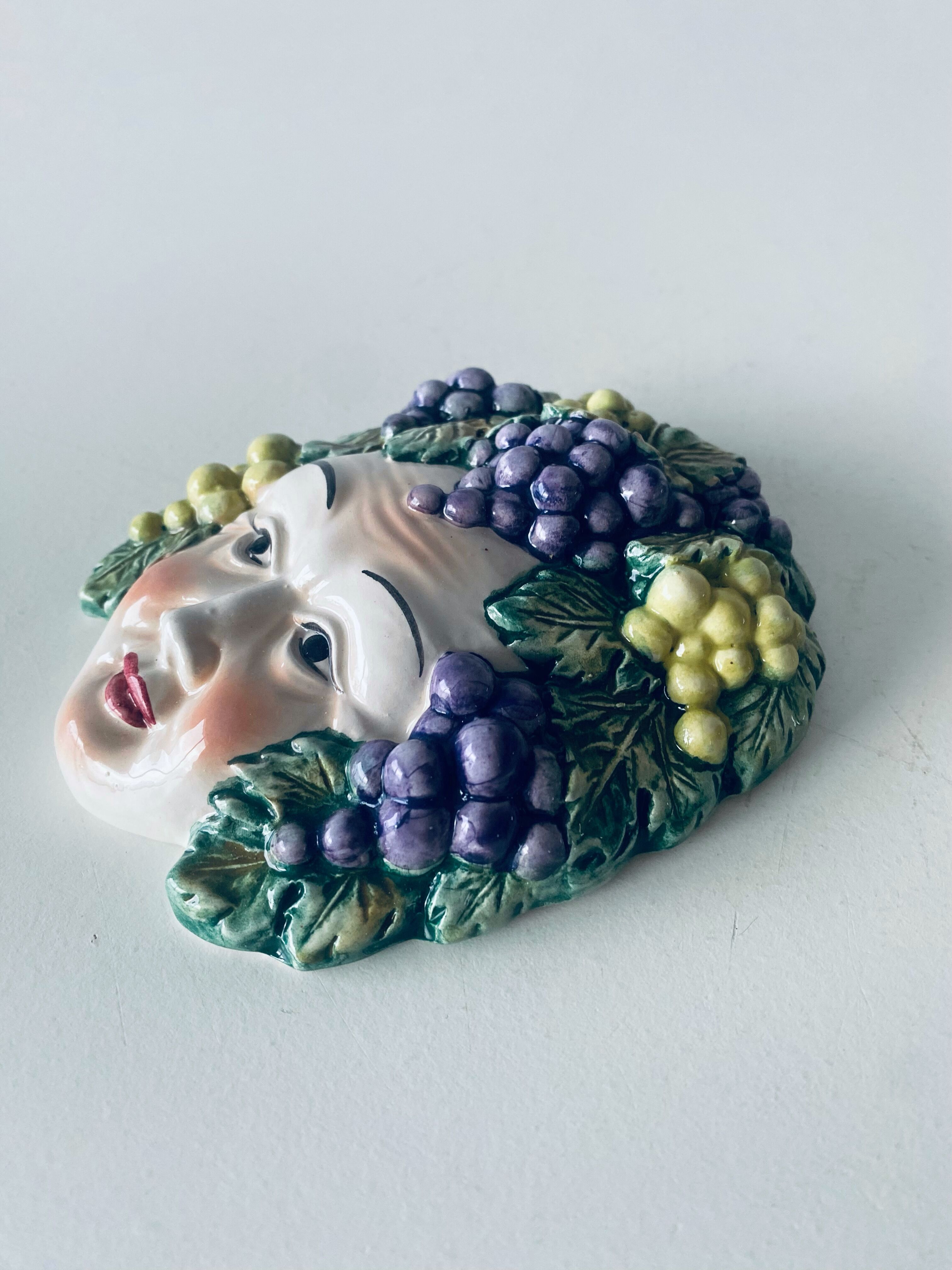 Ceramic wall face signed Il Falco