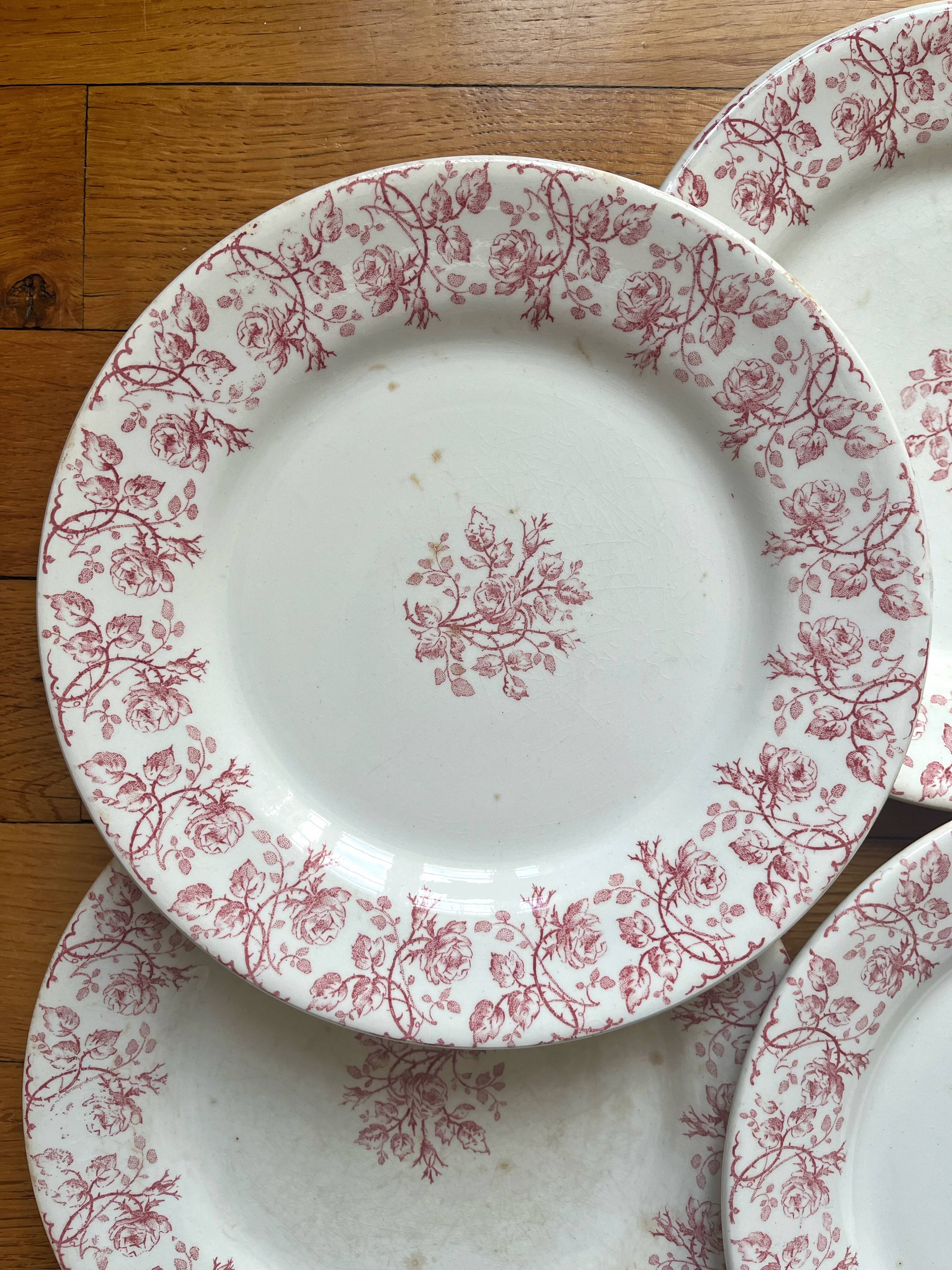 4 flat plates in iron earth Garland of roses, Opaque de Gien