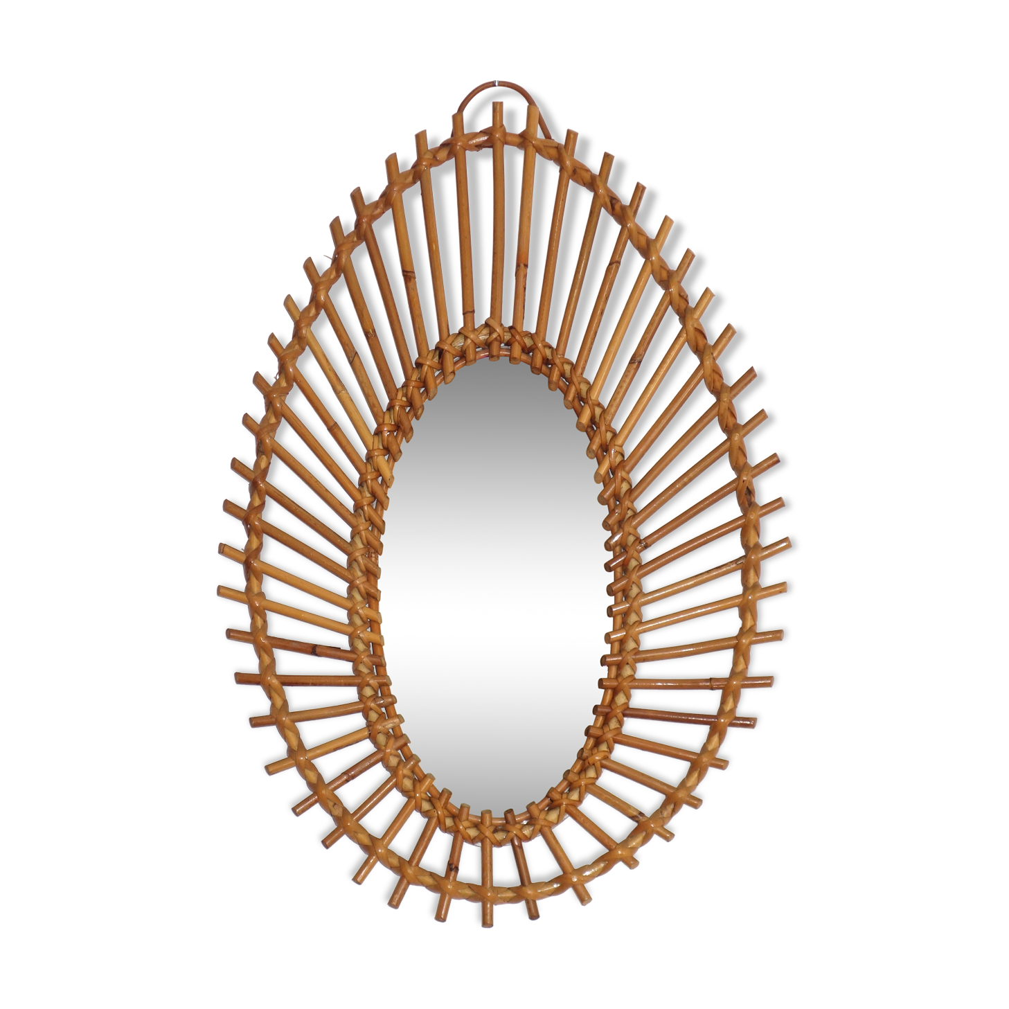 Free-form sun mirror in 60s rattan