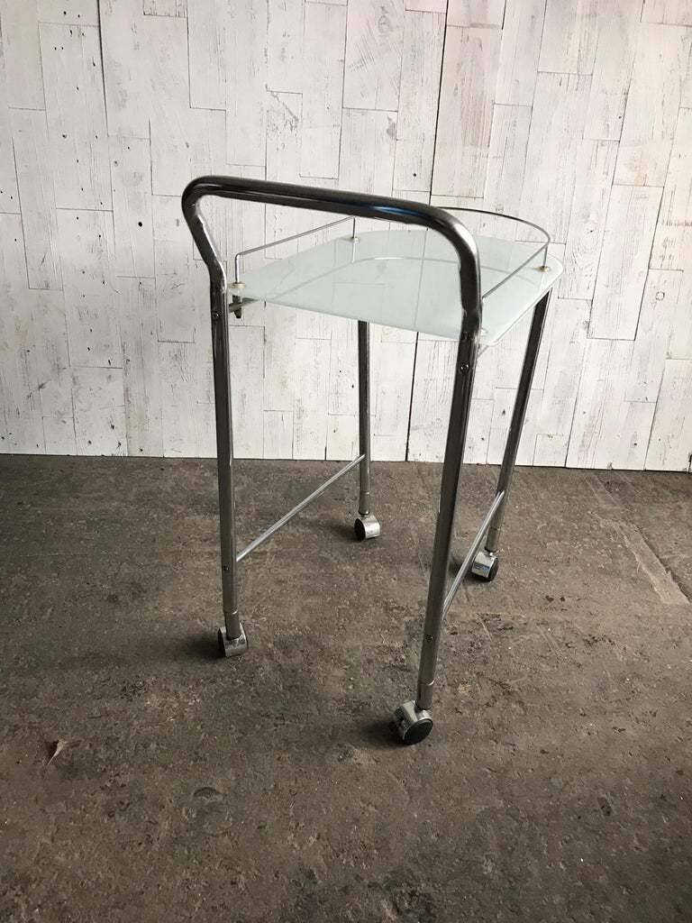 Chrome and transparent glass rolling dessert trolley, French Regency style from the 1960s.