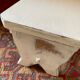 Patinated wooden footrest.