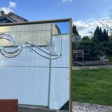 Miroir style vénitien à décor gravé et encadrement doré