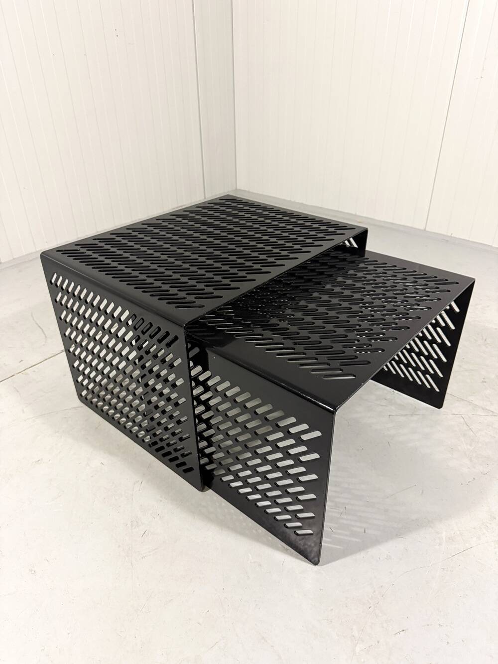 Black perforated steel nesting tables Italy 1980’s
