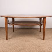 Round coffee table, two levels, danish in teak, brass and cannage