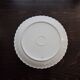 Vintage round serving dish in white porcelain with twists by Limoges Haviland