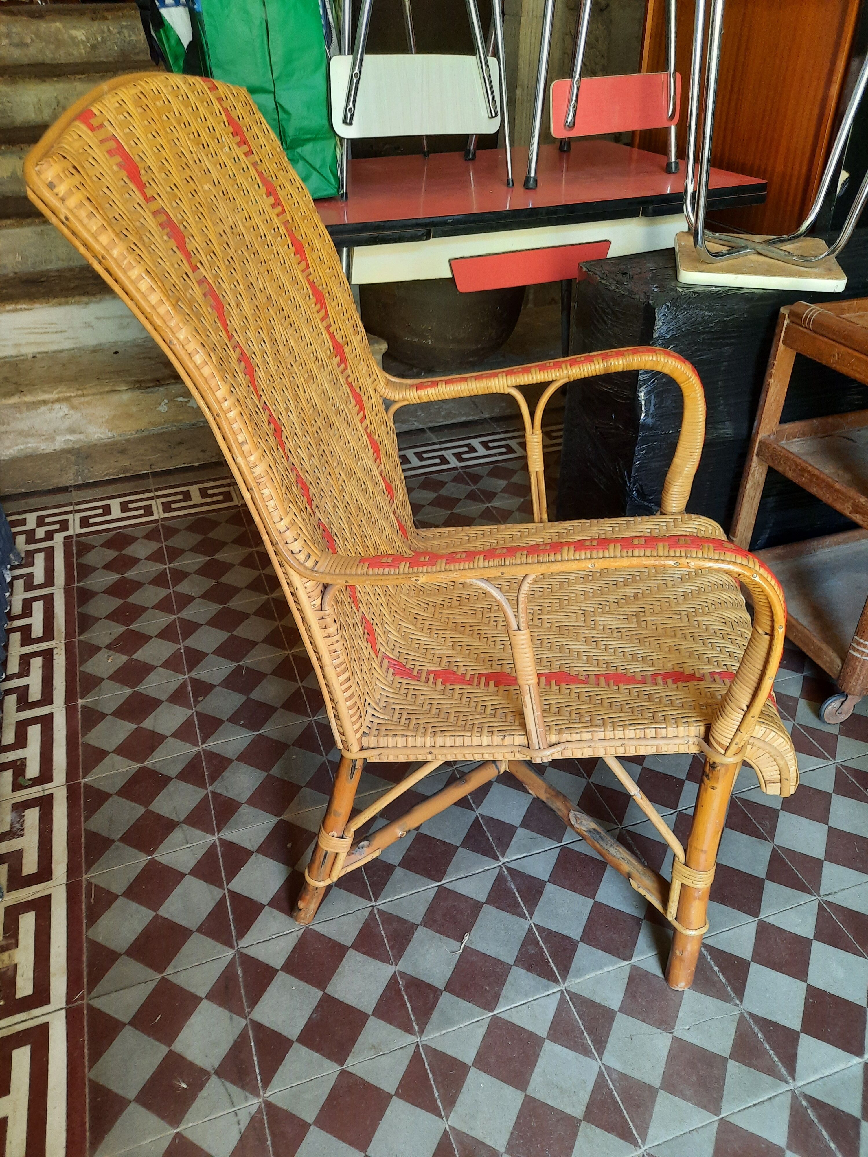 Braided rattan armchair